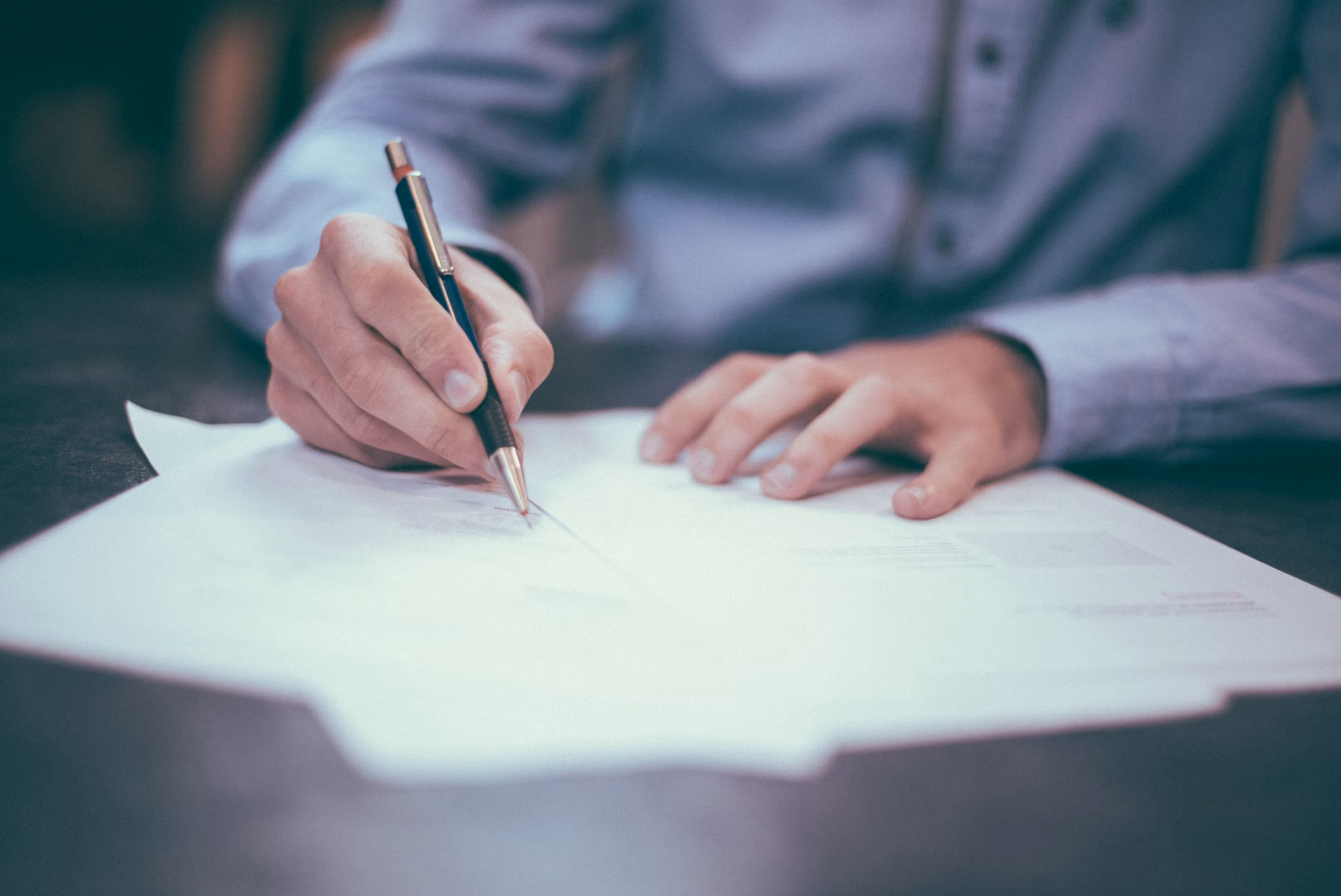 Person signing approval documents